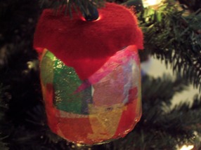 lighted drum Christmas ornament crafted from recycled baby food jar